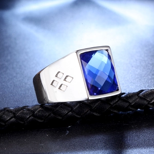 Men's wide stainless steel ring with rectangular blue gemstone and side square details