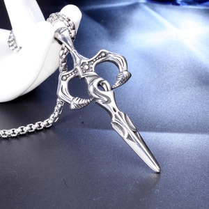 Detailed view of silver stainless steel sword pendant with intricate hilt on a box chain