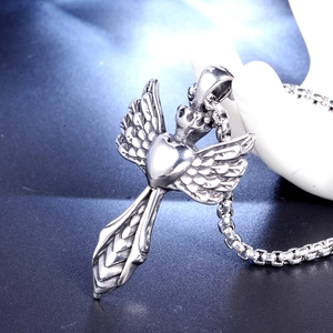 Vintage stainless steel wing heart pendant necklace with gothic crown and box chain detail