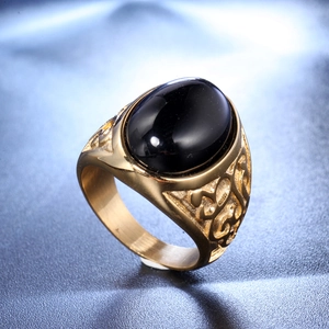 Vintage men's stainless steel ring with black oval gemstone and engraved totem sides