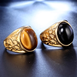 Vintage stainless steel rings with tiger eye and black onyx stones in gold setting
