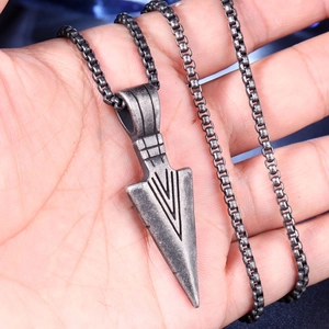 Vintage stainless steel arrow pendant necklace with box chain for a punk aesthetic look