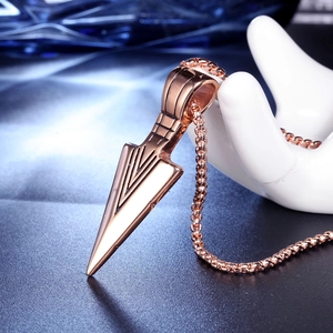 Arrowhead pendant in rose gold finish on box chain displayed on white jewelry stand