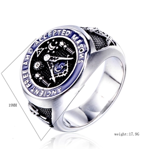 Macro detail of vintage Masonic skull ring with blue enamel and relief engraving