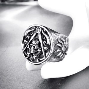 Vintage punk skull freemasonry stainless steel signet ring for men on display