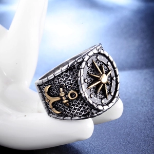 Retro nautical stainless steel ring featuring golden anchor and compass star details