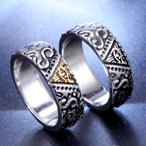 Vintage stainless steel Freemasonry Eye ring with embossed details and golden accents