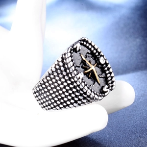 Vintage stainless steel compass ring for men with punk star design and silver-black finish
