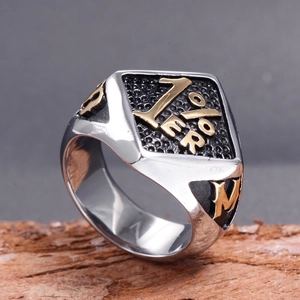 Motorcycle style stainless steel signet ring with golden 1% ER logo on diamond face
