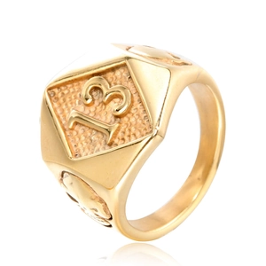 Detailed macro shot of vintage gold skull ring featuring a square face with embossed number 13