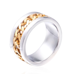 Macro view of industrial punk ring with golden chain inlay on polished silver steel band