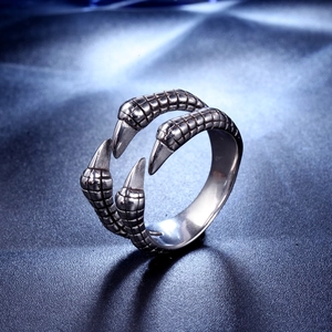 Punk style stainless steel dragon claw open ring in vintage silver finish on blue silk