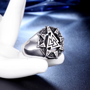 Men's silver stainless steel Viking Valknut ring with intricate knotwork on hand model