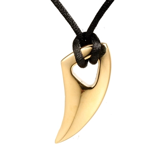 Polished gold horn tusk pendant with black braided cord necklace on white background