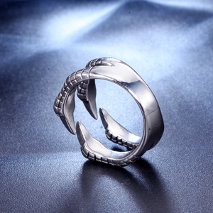 Adjustable stainless steel dragon claw ring with detailed scales and silver finish