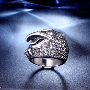 Retro stainless steel eagle head ring for men with detailed vintage silver carving
