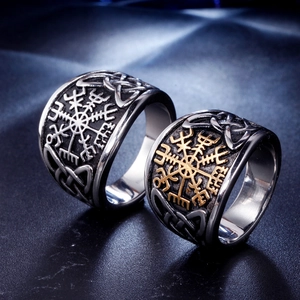 Vintage Viking steel compass rings in silver and gold tones with Celtic knot details
