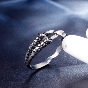 Vintage silver stainless steel dragon claw ring with detailed scales in open design