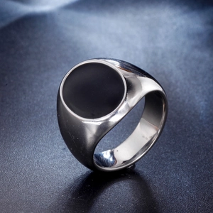 Polished stainless steel men's signet ring featuring a flat black round stone inlay
