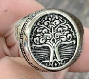 Vintage oxidized stainless steel signet ring for men featuring an oval tree of life design