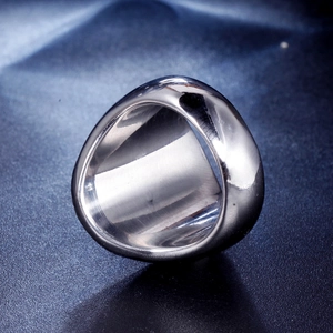 Polished silver barber razor ring showing minimalist industrial aesthetics and smooth mirror finish