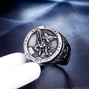 Vintage stainless steel St. Michael protect us ring with embossed cross design