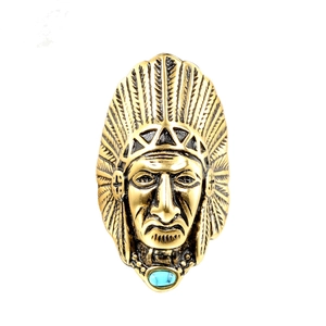 Macro shot of vintage titanium steel Indian chief ring with turquoise stone inlay