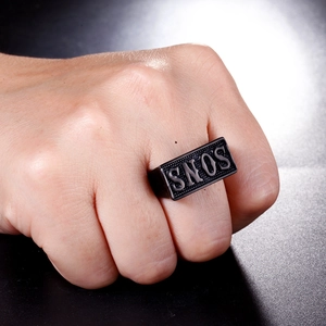 Close-up of Sons of Anarchy style stainless steel ring with embossed SONS lettering