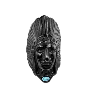 Detailed view of native Indian chief ring with turquoise stone and black feather carving