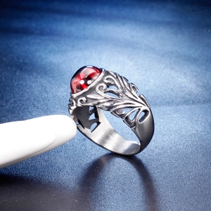 Vintage stainless steel ring for men with red gemstone and intricate floral carvings