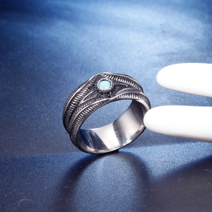 Bague vintage en acier inoxydable avec plume et turquoise de style bohème