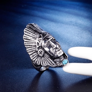 Vintage stainless steel Native American chief ring with turquoise stone and feathers