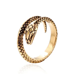 Minimalist vintage snake-shaped stainless steel ring in gold finish with black scales