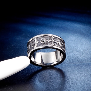 Gothic titanium steel wide band ring with vintage cross and floral lily relief details