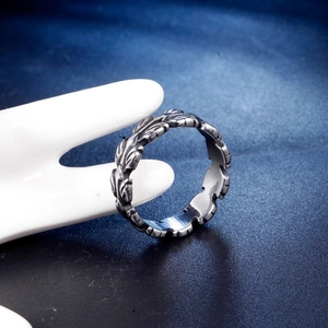 Vintage stainless steel feather ring for men with retro oxidized finish detail