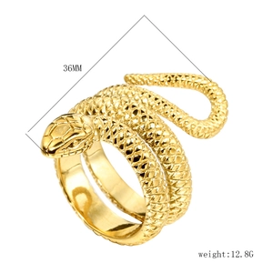 Close-up of golden vintage snake ring featuring detailed scales and 36mm spiral design