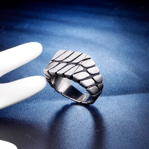 Close-up of brushed stainless steel ring with vintage chain link texture for men