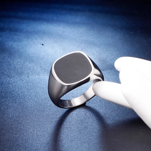 Polished silver signet ring with a smooth square black enamel top for men