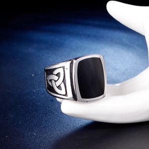 Retro men's titanium steel ring with black rectangular enamel and Celtic knot relief