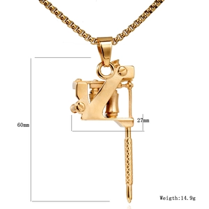 Pendentif machine à tatouer dorée avec dimensions 60mm par 27mm de style hip hop
