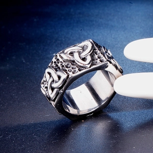 Vintage stainless steel Viking ring with relief Celtic knot pattern on a wide band