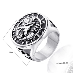 Detailed relief of Saint Michael on retro stainless steel cross ring with black oxidized finish