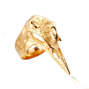 Golden Viking crow skull ring with Vegvisir compass and Valknut symbols in punk style