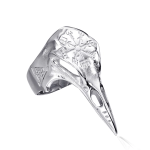 Detail of Viking raven skull ring with Vegvisir symbol and Valknut engraving on steel