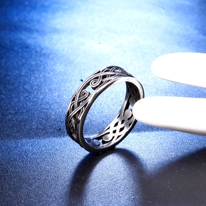 Vintage stainless steel wide band ring for men with intricate Celtic knot patterns