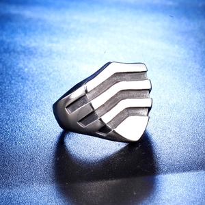 Minimalist geometric mens ring with matte silver finish and stepped architecture design