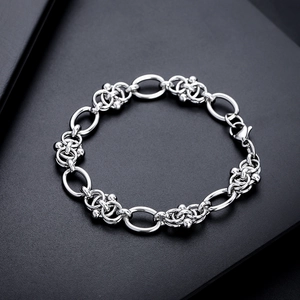 Polished silver titanium steel chain bracelet with large oval links and lobster clasp