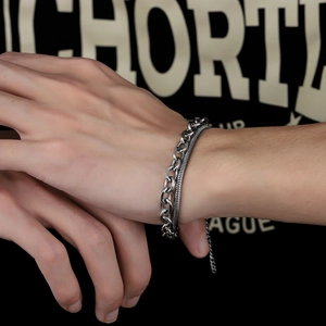 Double-layered silver titanium steel bracelet featuring curb and snake chain design