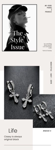 Vue détaillée des boucles d'oreilles créoles croix en argent avec zircons brillants