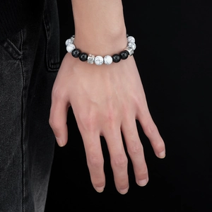 Men's white turquoise beaded bracelet with black obsidian and engraved silver charms